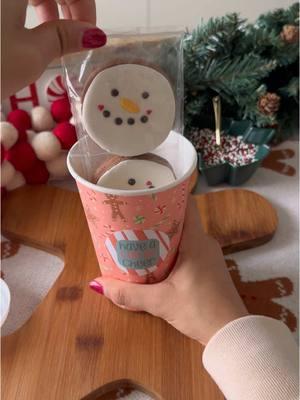 I couldn’t let the week end without one last Christmas cookie packaging idea!  ☃️For these mini snowman cookies, I added two cookies to a cookie sleeve then cut off the excess and sealed one send of the leftover bag to use for the remaining cookies. I printed some have a cup of cheer stickers and used my Cricut to easily cut them out then added one to a festive paper coffee cup for a fun holiday treat! #asmr #asmrsounds #cookies #christmas #christmascookies #royalicing #royalicingcookies #baking #cookiesoftiktok #baketok #cookievideo #cricutprojects #cookiedecorating #decoratedcookies #cookievideo 