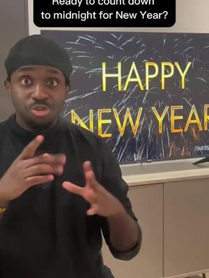 Are you ready to learn countdown to the new year in BSL (British Sign Language) ? 🤩🔢🎇 Video description:The image shows a black man wearing a black beanie and a black shirt. He is using British Sign Language. Behind them, a large screen displays the words "HAPPY NEW YEAR" in bright yellow text, with fireworks in the background. At the top of the image, a text overlay reads, "Ready to count down to midnight for New Year?" The setting appears festive, celebrating the approach of the new year. #BSL #BritishSignLanguage #UK #DeafUk #Lingvano #NewYear #SignLanguage