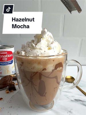 Easy hazelnut mocha- no frother required 😉 #hazelnut #mocha #latte #espresso #coffe #coffeetiktok #coffeeshop #coffeeathome #chocolate #carnationnation #carnationmilk 