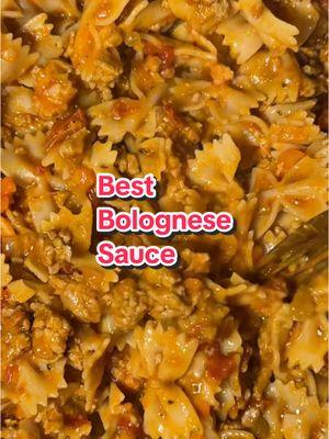 Classic, rich, & hearty bolognese🍝. The only homemade sauce I’ve remade over and over again because it’s THAT good! 1 lb ground beef & pork blend S+P 2 Tbs butter  1/2 white onion, finely chopped 1 carrot, finely chopped  1 celery stalk, finely chopped  1 cup whole milk (or full fat coconut milk for DF) 1 cup dry white wine (or chicken broth)  14 ounces canned whole tomatoes  1/2 teaspoon ground nutmeg  1 teaspoon Italian seasoning  1 teaspoon sugar  Cooked pasta Reserved pasta water (start with 1/4 cup, add more as needed) Parmesan for topping  Brown the ground meat with S+P  in a large pan over medium heat until no longer pink. Drain and remove meat from the pan. Melt 1 Tbs butter in the pan while adding onions, carrot, celery, and S+P. Sauté veggies for 6-8 minutes, stirring occasionally. Add the meat back into the pot with the veggies and stir in milk. Reduce heat to a simmer and cook for 15-20 minutes until the milk is absorbed, stirring occasionally. Repeat this step with the white wine, cooking for another 15-20 minutes. Use your hands to gently crush the whole tomatoes in a bowl. Pour tomatoes, Italian seasoning, sugar, and nutmeg into the pot and stir to combine. Cover and turn the heat to the lowest setting and let the sauce cook for 2.5-3 hours, stirring occasionally. You can add a little water if it starts to look dry. Taste and adjust for S+P. Once the sauce is simmered, stir in pasta, pasta water, and 1 Tbs butter. Serve with Parmesan on top.  #bolognese #homemadepasta #pastasauce #newyearsrecipes #newyearsmeal #homemadefood #dinner 