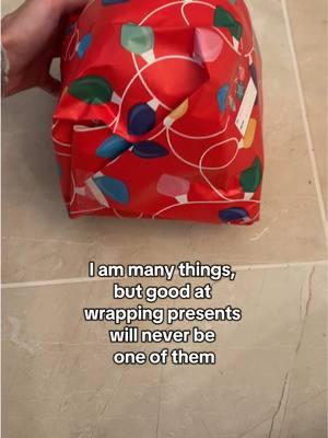 My only fault is being unable to wrap presents like a human #giftwrapping #wrappingpaper #presents #gifts #wrappingfail 