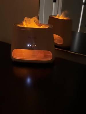 This diffuser can used as a humidifier or oil diffuser and looks like a mini fireplace..  #cozyvibes #diffuser #oildiffuser #saltlamp #homedecor #airpurifier #momtok #cozyreading 