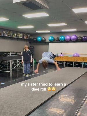 watch me try to teach my sister a dive roll…. (it didn’t go well) 🙏🏻🙏🏻#dance #tutorial #tricks #dancer #viralvideo #flips #parkour 