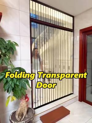 Crystal folding doors can isolate the cooking fumes from the kitchen, prevent the air conditioning in the living room from leaking to the stairs,  protect the door, and save space #slidingdoors #glassdoor #glassdoors #foldingdoor #safetydoor  #aluminum #alloy #interiordesign #tottme #tottmetal