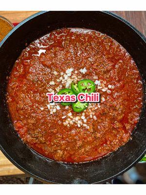 The “Texas Chili” recipe is the most popular of the 5 chili recipes on MeatChurch.com. Grab my Texas Chili seasoning while you’re there!   Ingredients:
 •	2 lbs ground meat 
 •	1 lb HOT breakfast sausage
 •	1 lb chuck roast (sub brisket or other big cut)
 •	3 med red onions, diced
 •	1 head of garlic, minced 
 •	84 oz of tomatoes and sauce total. Use the below or interchange to your liking as long as you use at least 84 ounces)
 • 2, 28oz can crushed tomatoes with juice
 • 1, 28oz Italian style diced tomatoes with juice
 •	1, 7oz can Chipotles in Adobo Sauce, diced. Preserve the liquid.
 •	1 beer (sub beef broth)
 •	5-6 T Meat Church Texas Chili Seasoning
 
 Add the olive oil to a very large skillet. Sauté the onions, garlic and adobo peppers (including all the liquid from the can). You may have to cook in 2 batches if you don’t have a really large skillet. 
 Cook for about 10 mins until the onions are translucent. Remove from skillet and place the mixture in your slow cooker or dutch oven.
 
 Cook the ground meat and breakfast sausage completely in the same skillet. Drain the fat and place all of the meat in the slow cooker or dutch oven.
 
 If you are starting with a raw chuck roast, cut it into cubes and brown it in a cast iron skillet. Then place it in the dutch oven or slow cooker. 
 If you are starting with a smoked chuck then simply cut it into small pieces and dump it into the dutch oven or slow cooker.
 
 By this time you already have the meat, onions, garlic and adobo peppers in your slow cooker or dutch oven. Now add the tomatoes with the juice, 1 beer and 5 T of Meat Church Texas Chili Seasoning. Mix thoroughly. 
 
 This chili can cook in 3 hours. However, it is better if you can cook it for 6 - 8 hours. The ingredients are already cooked at this point, but we will simmer this chili all day to break down the meat and meld the flavors together.
 If you are using a slow cooker:
 Cook the chili on low for 6 - 8 stirring periodically.
 
 If you are you are using a smoker:
 Cook the chili at 225 for for 4-5 hours uncovered stirring periodically. Cover and continue to cook for 2-3 more hours. Garnish and enjoy! #MeatChurch #MeatChurchBBQ #TexasBBQ #BBQ #Chili #Soup #ComfortFood #ChiliSZN #Traeger #TraegerRecipes #CookingShow #DinnerIdeas #DinnerWithMe