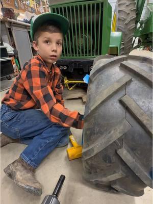 Jackson and I working together  on the hubs of his @John Deere #johndeere112 #justajacksonthing #countryboy #fyp #jacksonfarmer #makefarmingfun #oldschool #rockyboots #restore #gardentractor 