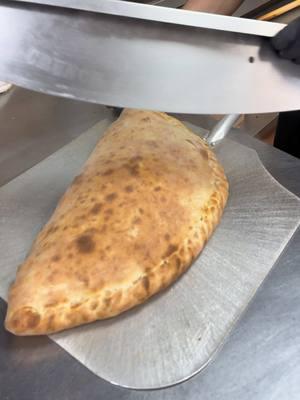 Guess what’s inside this BEAST Calzone 🔥🔥🤭 .@Burattino Pizza Toronto  . . . #PizzaLovers #PizzaTime #CheesyGoodness #PizzaArt #FoodieLife #PizzaPerfection #SliceOfHeaven #PizzaGoals #EpicEats #PizzaCravings #FoodTikTok #PizzaVibes #FoodPorn #PizzaCreation #InstaPizza #burattinopizza #120pepperoni #crunchbabycrunch