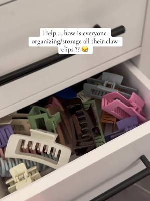 help a girl out ….. how is everyone organizing all their claw clips ???? Cuz this chaos ain’t it 🤭😖🥲 #storage #clawclips 