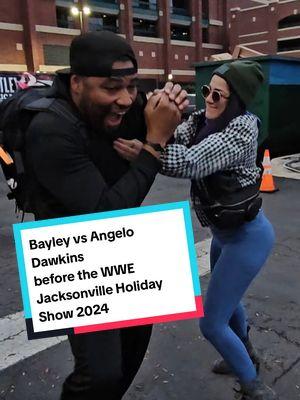 The Street Profits Angelo Dawkins rips Bayley and her Golden State @warriors  before the @WWE Jacksonville Holiday Show 2024! Thanks for the photo and the singalong, @Angelo Dawkins !!! 😂🤘🏼👨‍👦🎅🎄 #bayley #bayleywwe #angelodawkins #streetprofits #WWE #wwefan #lebronjames #fyp #fypシ 