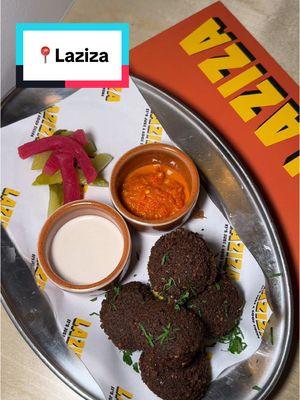 There is a new hot spot in Bed Stuy that you need to check out!! Laziza just opened and is bringing a vinyl listening bar, middle-eastern dishes, and cocktails under one roof. The space is funky and intimate and it is designed to make you stay for hours. Their menu is comprised of hot and cold mezze, dips and their incredible charcoal-grilled skewers. Come here on a weekend to see their vinyl dj spin while enjoying such a great time.  WHAT TO ORDER: 🧆 Hummus 🌶️ Labne with zaatar chili crisp 🫑 Muhammara 🧆 Falafel 🥗 Tahini caesar 🍖 All of the charcoal grilled skewers  🍭 Persian cotton candy 📍 Laziza #nyctok #newopenings #bestofny #newyorklife #thingstodonyc #hummus #middleeastern #falafel #brooklyn #bestofny #FoodTok 