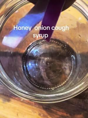 Honey onion cough syrup is a natural remedy often used to soothe coughs and throat irritation. Here's a simple recipe to make it: Ingredients  - 1 large onion (sliced) - 1 cup of honey (preferably raw) - Optional: lemon juice or ginger for added flavor and benefits Instructions  1.  Slice the Onion :Cut the onion into thin slices. 2. Layer the Onion and Honey In a jar, alternate layers of sliced onion and honey. Start with a layer of onion, then add honey, and repeat until all the onion is used. 3. Let it Siit :Seal the jar and let it sit for at least 12 hours at room temperature. This allows the onion to release its juices, mixing with the honey. 4.  Strain (optional) : After resting, you can strain the mixture if you prefer a smoother syrup or leave it as is. 5. Keep the syrup in the refrigerator. It can last for several weeks. Take 1-2 tablespoons as needed to help soothe a cough or sore throat. #honeyonioncoughsyrup  #onions #onionremedy #barefootwithwellness #wellness #naturalremedies #barefootwithwellness #fyp #wellnesstips 