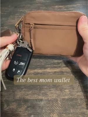 This wallet fits an incredible amount of necessities when you’re out and about! Literally obsessed with it & it’s so affordable 🤎😎 #womenswallet #wallet #iriswallet #purpleticket #purpleticketforpurpleticket #musthave #momlife 