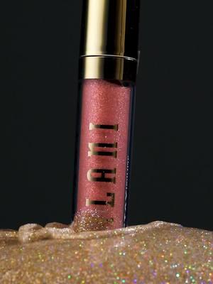 Hear that?🔊 It’s just a little sparkle, sparkle coming your way. Stay Put Liquid Lip Shimmer Lipstick in Cheers delivers a magenta shimmer that’s bold, bright & here to take the spotlight!🍾 Get into the glitter at @Walmart online, @CVS Pharmacy in-store & online, @Walgreens in-store & milanicosmetics.com!🛍️ #MilaniCosmetics #ASMR #Shimmer #Lipstick 