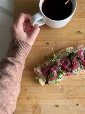 trust. throw in a few strawberries or fruit of choice 👌🏼 Recipe: 1 piece of sourdough lightly toasted  2 slices of thinly sliced swiss  2 slices fresh deli ham  broccoli sprouts/micro greens pickled red onion balsamic glaze  *chefs kiss* #cyclesyncing #intuitiveeating  #healthylunch #easylunch #lunchideas #Recipe #aestheticvideo #healthyrecipe #imjustagirl 