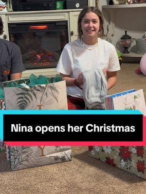 Nina opening her gifts from us. (Jesse and her will exchange gifts next week) #christmas #presents #holiday #sweet  #jesseismyson #Ninaishisgitlfriend #welcomeback 