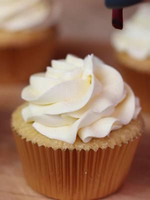 “Pop, fizz, frost! 🥂✨ These champagne buttercream cupcakes are the perfect blend of celebration and sweetness. Light, fluffy, and topped with a sparkling buttercream swirl, they’re here to add a little luxury to your dessert table. Cheers to treating yourself! 🍾🧁 ✨ INGREDIENTS ✨ Champagne Reduction Sauce: * 1 1/2 Cups Champagne  Cupcake batter: * 1 ½ Cups cake flour * 1 ½ tsp. baking powder * ¼ tsp. salt * ½ Cup unsalted butter (melted) * 1 Cup granulated sugar  * 2 eggs (room temperature) * 2 tsps. vanilla extract * 2 tablespoons champagne reduction sauce * ⅓ Cup milk (whole works best) Frosting:  * 1 Cup unsalted butter room temperature * 3 Cups powdered sugar * ¼ tsp. edible gold luster dust * ½ tsp. vanilla extract  * 3 tablespoons champagne reduction sauce ✨INSTRUCTIONS ✨  Champagne Reduction Sauce: 1. Pour 1 1/2 cups champagne into sauce pan.  2. Bring to a boil Reduce heat to medium and allow champagne to reduce for 10 to 15 minutes.  3. Remove from heat when 1/2 cup champagne reduction is left 4. Cool to room temperature before adding to batter Cupcakes: 1. Preheat the oven to 350°F.  Whisk the cake flour, baking powder, and salt together in a large bowl. 2. In a stand mixer, cream the melted butter, sugar, eggs, vanilla, and champagne reduction together until combined. 3. In a separate bowl sift or mix together all the dry ingredients. 4. Mix in half of the flour mixture to the wet ingredients..  5. Then mix in the milk and the rest of the flour mixture until fully combined. DO NOT OVERMIX. 6. Fill liners half full with batter. 7. Bake at 350°F for 18-20 minutes or until a toothpick comes out clean.  8. Remove from pan and cool on wire rack. 9. Let cupcakes cool completely before frosting. Frosting:  1. In a stand mixer fitted with the paddle attachment, beat softened butter until pale and whipped (about 5 minutes)  2. Add in powdered sugar, gold luster dust and vanilla until smooth and creamy. 3. Add the champagne reduction 1 tablespoon at a time until fully combined. 4. Beat the buttercream for 3-4 minutes on high speed until light and fluffy.  5. Frost cupcakes (I used a Wilton 2D piping tip) #cupcakes #cupcakerecipe #bridalshowercupcakes #champagnecupcakes #desserttable 