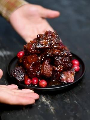 Poor man burnt ends using @1855 Black Angus Beef  chuck roast, these were absolutely delicious. With @whistlepigwhiskey whiskey and @melindasfoods hot honey, these burn ends were packing a burst of flavor, some heat and just worked well. For the cranberry sauce, in a pot combine fresh cranberries 1 cinnamon stick, maple syrup @Melinda’s Hot Sauce  Hot honey. Zest of lemon and juice, OJ, @brushfirefarm jams a pinch of salt and a shot of @WhistlePig Whiskey  whiskey, ok maybe two, or three whips counting? Cook this over medium heat while constantly stirring until the cranberries are popped and sauce has reduced. Chuck was cut into three, this allowed for more crust buildup while helping with moisture retention. It was then seasoned with preachers from @Fire & Smoke Society  and smoked in the @HALO Products Group  using @Kingsford  pellets Once the chuck had some bark cut it into burnt ends pieces and place it in foil paper. season it some more add a couple pats of butter and sauce them up with that cranberry sauce. Wrap tightly and back into the smoker it goes until they are perfectly tender and melt your mouth! Blades from @sergio menchaca  #burntends #cranberrysauce #Foodie #delicious #1855blackangusbeef #fyp #smoked #kingsfordcharcoal #melindas #bbq