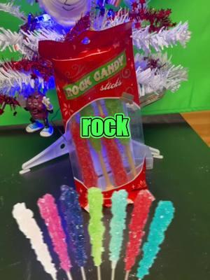 First time trying rock candy #fyp #foodreview #rockcandy #candy #Christmas #winter #winterseason #lollipop #xyzcba 