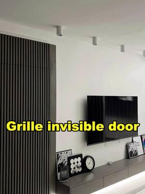 wpc grille invisible door background wall installation. #wpc #wallpanels #wpcwallpanel #wpcwallcladding #flutedwallpanel #buildingmaterials #walldesign #renovation #deco #harmercoverings 