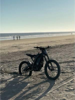 Spawned on the beach #surron #fyp #wheelie #72v #beach #viral #ai 