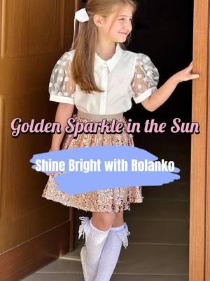 Twirl, sparkle, and shine! 🌟 Watch her glow in Rolanko’s golden sequin dress, capturing the sun’s magic with every move. 🌞 Perfect for those days when you just want to sparkle a little brighter. ✨ #rolanko #sequinskirt #shineon #goldenmoments #kidsfashion #kidswear #OOTD #fyp 