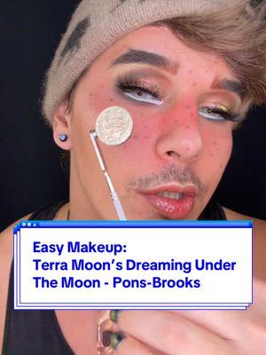 Easy Makeup: Ep.93 ➡️ Dreaming Under The Moon Collection* ➡️ @Terra Moons Cosmetics ➡️ 1/14 shade looks! ➡️ Shade: Pons-Brooks* ➡️ Soft Neutral Beat!  Pons-Brooks* - This shade is the type of shade that is just so neutral and normal at first glance it almost never would’ve excited me if I didn’t know who made it. Because if you judge a pigment by its pen when it comes to Terra Moons, you will almost always be left missing out. Once you apply the shade, you get soft shifts from its dominant gold to oranges and greens that make this truly something special, like an autumnal cider warm in the cup, or a New Year’s Eve golden glimmer shimmering as we beckon in another trip around the sun. Truly a surprise and a wonder to behold. The whole eye look is ONLY this shade with neutral brown mattes and brown liner with lashes! Pons-Brooks* is also the Cupid’s Bow highlight! The white liner is the incomparable Hot Line in White from @trixiemattel @Trixie Cosmetics  The nail lacquer is the new magnetic from @mooncat called “Curiosity’s Trap”! And I’ll be doing a look for every single shade in this collection! Thank you for the support! 💐🖤 *This item was gïfted in PR, no obligation to post. #mua #makeupartist #makeup #easymakeup #makeuptips #makeuptutorial #makeuptutorials #terramoonscosmetics #Eyeliner #eyeshadow #eyeshadows #indiemakeup #indiemakeupbrand #indiemakeupbrands  #multichromemakeup #multichromeeyeshadow #multichromeeyeliner #duochrome #duochromeeyeshadow #duochromeeyeliner #hydraliner #hydroliner #graphicliner #graphiceyeliner  #terramoons #terramoonscosmetics  #mooncat #trixiemattel #trixiecosmetics