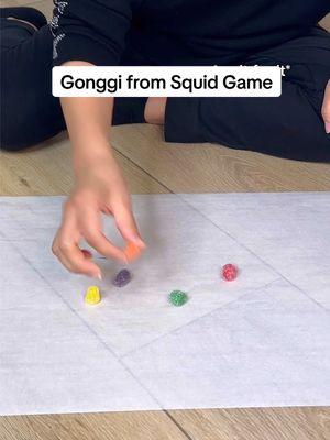 Not her using jelly beans to play gonggi in Squid Games…the plot twist though #candy #food #squidgame #gonggi #bread #milk #eating #kimbap #game #challenge #squidgamechallenge 