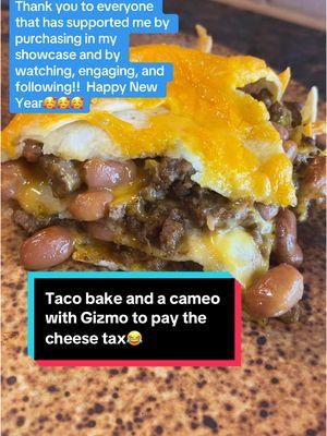 This taco bake is so easy, affordable, and delicious!!  Recipe at the bottom #casserole #casserolerecipe #casseroledishtiktok #weeknightdinner #tacobake #tacocasserole #tacolasagna #Recipe #recipes #recipesoftiktok #EasyRecipe #easymeal #easycasserole #Foodie #FoodTok #gizmo #lifeofashihtzu #shihtzusoftiktok #gizzytheshihzy #pooochacho #christiecrocker #christiecrockerskitchen #lymphoma #follicularlymphoma #lymphomawarrior  1 to 1 1/2 lbs ground beef 2 cans pinto beans drained 12 more or less ounces shredded cheese 1 packet taco seasoning  12 flour tortillas.  You can use less if you want Preheat oven to 350 Cook ground beef and then add taco seasoning to that.  In a casserole dish 9x13 or larger use 2 whole tortillas and then cut 2 more for the sides.  Too tortillas with 1/2 of the ground beef, then 1/2 of the pinto beans and top that with however much cheese you want.  Repeat the first layer using up the rest of the beef and beans, and top that with more cheese.  For your final layer I used the same amount of tortillas as the 1st and 2nd layer and then topped with more cheese.  Bake at 350 for about 30 minutes and your cheese is melted.   Taco Bake Taco Casserole  Taco Lasagna 