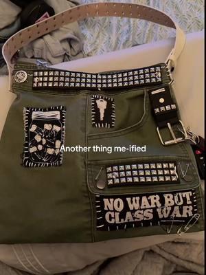 Bag made from $3 clearance skirt. 2 belts that don’t fit me anymore. Thrifted thread. Safety pins. Key patches I made. Etsy: “No war-” patch from phoenixcompost. Button from RazNasty. Teeth Jar from ThreeRaccoons. #upcycling #repurposedfashion #upcycledfashion #upcyclingclothing #makemoreart #alternativeclothing #repurposedclothing #textileart #handsew #handsewn #handmade #handmadeclothes 