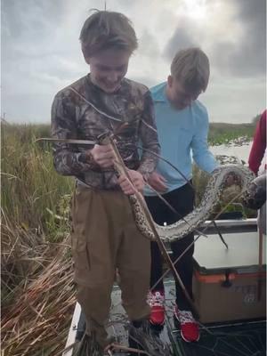 Had some clients out on a bass fishing charter when we stumbled upon a good-sized python in one of the grass patches. These boys had no fear and were on that snake in a matter of minutes - no hesitation! Call that a win for the Everglades with one more invasive python removed from the ecosystem. #epicairboattours  #floridaeverglades #everglades #fyp #burmesepython 