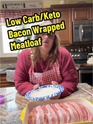 #ketomeatloaf #lowcarbmeatloaf #lowcarblife #lowcarbrecipes #lowcarbdiet #fyp #fypageシ #fypage #fypシ #dontmesswithmomma.               * Cooking spray * 1 medium onion, chopped * 1 stalk celery, chopped * 3 cloves garlic, minced * 1 tsp. dried oregano * 1 tsp. chili powder * 2 lb. ground beef * 1 c. shredded cheddar * 1/2 c. almond flour (I used pork rinds crushed) * 1/4 c. grated Parmesan * 2 eggs * 1 Tbsp. low-sodium soy sauce * Kosher salt * Freshly ground black pepper * 6 thin strips bacon * 		Preheat oven to 400°. Grease a medium baking dish with cooking spray  In a large bowl, combine all * Ingredients except bacon. Shape into a large loaf in baking dish, then lay bacon slices on top.  * 		Step 3 Cook until bacon is crispy and beef is cooked through, about 1 hour. If bacon is cooking too quickly, cover dish with foil.