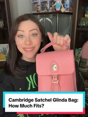 Replying to @Angie ⭐️ How much can I fit in the @Cambridge Satchel @Wicked Movie Glinda bag that @arianagrande selected for the film? #wickedmovie #cambridgesatchel #glinda #arianagrande #purse #collection #theozvlog 