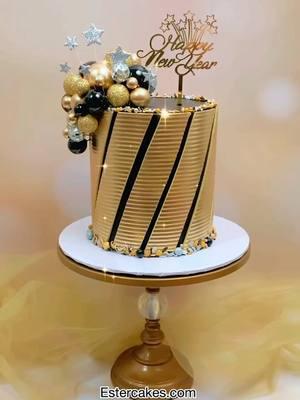 Happy New Year 🥳🎊🎉❤️ to all my sweet friends, families and followers  Wishing you and your family A Blessed New Year 2025 Gold smooth hound and Micro scallop cake comb from Estercakes.com Cake stand from @opulenttreasures  Use code : Ester20 for discount  Sprinkles from @manvscakes  Use code : ESTER25 for discount  Gold dust from @cakesbyangelamorrison #cakedesigner #gold #fypシ #tiktok #cakeartist #cakelover  #cakedecorator #happynewyear #2025 ##goldsmoothhoundcomb #esterscomb 