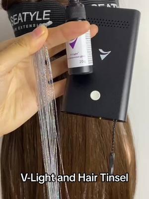 Install hair tinsel with V light glue. #vlighthairextensions #vlight #hairtinsel #hairtutorial #hairextensions 