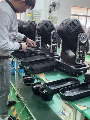 The casing installation for the 380W #IP65 #beammovinghead is in full swing, ensuring this rugged light is ready to perform in any outdoor event. #ip65light #beamlights #assemblyline #stagelightingproduction #outdoorlighting #outdoorevents #waterprooflight #concertlight #eventdecor #eventlights #movingheadbeam #shorts 