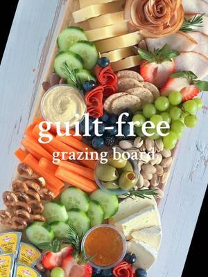 New Year, New Grazing Goals! 🎉✨ Start the year off right with this health-conscious grazing board full of delicious, guilt-free options! Perfect for staying on track without sacrificing flavor. Here’s what’s on it: * Lean turkey slices and turkey pepperoni  * Crisp cucumber slices & carrot sticks  * Light cheeses * Roasted almonds & pistachios * Creamy hummus * Pretzels & cracker thins * No-sugar-added jam  * Fresh fruits  This board is proof that healthy can be just as fun and tasty! Cheers to a fresh start!  #fyp #charcuterieandthings #charcuterieboard #cheeseboard #foodstyling #DIY #FestiveEats #foodstyling #healthy #healthyrecipes #newyear 