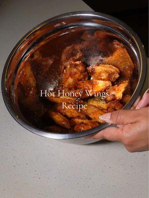 We got Wingstop at Home! I’m over spending $15 for a 6pc combo! Hot Honey Wings at an affordable price & they’re AIR FRIED!  Ingredients: 1.5lbs wings 2tbs olive oil 1tsp baking powder 1tbs garlic powder  1tbs onion powder  1tbs chicken bouillon  1/2 tsp lawrys seasoning  1/2 smoked sea salt (optional) Hot Honey Sauce: 1/2 stick of butter 1tbs garlic powder  1tbs onion powder  1tbs cayenne pepper  2tbs honey  Mix well, drizzle then toss  #foodreview #wingstop #hothoneywings #hothoney #wingrecipe #foodtiktok #wingstopranch #blackgirlfollowtrain  