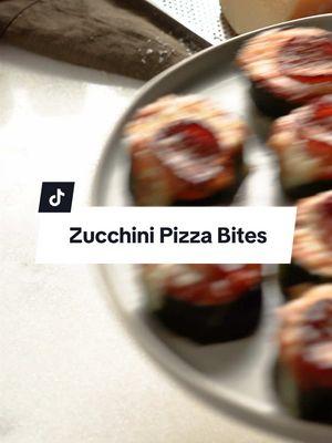 Zucchini Pizza Bites! 🍕🍕🍕 Ingredients - 4 large zucchini (about 2 inches in diameter) - ½ teaspoon ground pepper - ¼ teaspoon salt - ½ cup reduced-sodium marinara sauce - ¾ cup shredded part-skim mozzarella cheese - 16 slices pepperoni - 2 tablespoons finely grated Parmesan cheese Directions 1. Preheat oven to 350 degrees F. Cut zucchini crosswise to make 16 (1-inch-thick) slices. Arrange the slices in a single layer on a rimmed baking sheet. Sprinkle with pepper and salt. Bake until starting to soften, 15 to 18 minutes. Remove from oven; top evenly with marinara, mozzarella and pepperoni. 2. Switch the oven to broil and place a rack 8 inches from the heat. Broil the bites until the cheese is lightly browned and the pepperoni is crispy around the edges, about 5 minutes. Sprinkle with Parmesan. For full recipe information, go to our profile then click the likeshop link. From there, click on the image that corresponds to this video. #fyp #pizza #zucchinirecipes #zucchinipizzabites #lowcarb #lowcarbrecipes 