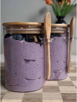 BLENDED BLUEBERRY PROTEIN CHIA PUDDING It’s come to my attention that some of you hate the texture of chia seed pudding so… hopefully this helps!l Ingredients 1 cup frozen blueberries 1 1/2 cups unsweetened vanilla almond milk 1/4 cup sugar free maple syrup (or any sweetener of choice) 1/2 cup chia seeds 2 scoops @Flex Brands vanilla protein powder (discount code MARIANNA15) Toppings: fresh blueberries and peanut butter  Instructions: 1. Add blueberries, almond milk, and maple syrup to a blender and blend until smooth.  2 Then add chia seeds and protein powder and blend again on high speed until it starts to thicken into a pudding like texture. This may take some time!  3. Evenly distribute amongst 3 glass jars then top with blueberries and peanut butter and store in the fridge for up to 4 days.  #chiaseeds #mealprep #highprotein #chiapudding 