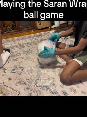 The Ojo boys playing the Saran Wrap ball game. Very slow starting but got a bit exciting. #saranballgame #saranwrapball #christmas #newyears #gifts #family #fun #foreverraneidaze #christmasgames 