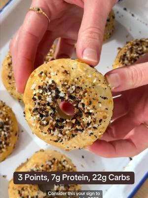 Thousands of you made these Two-Ingredient Dough Everything Bagels last year! And with 7 grams of protein and only 3 Points, we had to give them the spotlight. What you’ll need: ✨ Cooking spray - 4 sprays ✨ Self-rising flour - 1⅓ cups ✨ Plain fat-free Greek yogurt - 1 cup ✨ Everything bagel seasoning blend - 1 Tbsp How to make it: 1. Preheat oven to 350℉. Lightly coat a silicone mini bagel pan with nonstick spray. 2. Place flour and yogurt in a medium bowl; stir well with a wooden spoon until just combined and then keep mixing dough in bowl with your hands until smooth, about 1 to 2 minutes (if dough is too sticky to knead, add 1 to 2 more tbsp flour); let dough sit 5 minutes. 3. Divide dough into 6 equal pieces. Roll each piece into a ball and press into one hole of prepared pan to form a bagel shape; repeat with remaining ingredients to form 6 bagels. 4. Lightly coat bagel tops with nonstick spray; sprinkle each with 1/2 tsp seasoning. Bake until lightly browned, about 15 to 20 minutes. Gently remove bagels from pan and enjoy warm or at room temperature. 💫 126 calories + 7 g protein + 22 g carbs + 1 g fiber + 1 g fat + 1 g sugar = 3 Points for 1 bagel (recipe makes 6 servings) #EasyRecipe #proteinbagel #highprotein #weightwatchers #everythingbagels #everythingseasoning #everythingbagelseasoning #easybreakfast #healthybreakfast #healthybreakfastideas #twoingredientdough #twoingredientrecipe #twoingredientbagel #twoingredients #weightwatchersrecipe #weightwatchersrecipes #wwrecipes #wwbreakfast #LowPoint