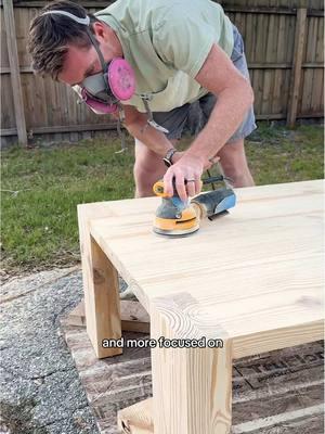 sanding this wood coffee table to make it smooth and ready for our living room #woodworking #diyfurniture #coffeetable #sandingwood #furniturebuild #handmadefurniture #woodworkingtips #sandingtechniques #woodgrain #furnituredesign #woodworker #woodworkingcommunity #diyprojects #homefurniture #customfurniture #furnituremaker #woodfinishing #craftsmanship #sandingprocess #woodshop