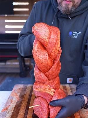 Braiding Hair ❌ Braiding Meat ✅ Starting 2025 with one of my favorites, a braided pork loin. Not only does it look cool when done, but you also get more seasoning on the pork when it’s cut like that. Cooked low and slow on my @webergrills Searwood and finished with a homemade bbq sauce. Easy and delicious 🤤  #grillinwithdad #bbq #porkloin #Foodie #Recipe #delicious #grilledpork #EasyRecipe #tasty