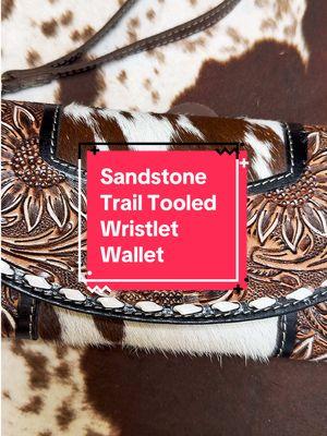 This wristlet wallet is the perfect mix of style and function! 😍 Hand-tooled details, earthy tones, and plenty of space for your essentials. ✨ Who else loves a piece that does it all? #myra #westernfashion #westernstyle #wallets 