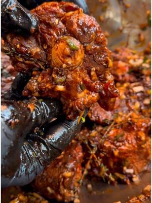 Slow-braised to perfection 🍖🔥These oxtails are tender, flavorful, and pure comfort in every bite. A labor of love that’s totally worth the wait! Who’s ready to dig in?  Braised Oxtails Ingredients 8 lbs oxtails (approx)  1 tsp ground allspice  5 sprigs thyme 10 cloves garlic, minced 1 bunch scallions, chopped 1 white onion, diced 3 tbsp ketchup 2 tbsp browning sauce 1 tbsp paprika 2 tbsp all-purpose seasoning 1 tsp complete seasoning 1 tsp black pepper 3-4 Scotch bonnet or habanero peppers, finely chopped (seeds removed; wear gloves) Oxtail Braising Ingredients 1 large onion, quartered 3 celery ribs, sliced 3 carrots, sliced 2 tbsp tomato paste 2 cups red wine (Cabernet Sauvignon) 8 cups beef broth (about 2 cartons) 4 bay leaves 1 tbsp olive oil Braising Oxtails Heat 1 tablespoon of olive oil in a large pot over medium-high heat. Sear the oxtails in batches for about 2 minutes per side until browned. Avoid overcrowding the pot. Set the seared oxtails aside in a bowl. Scrape up the browned bits from the bottom of the pot without removing them—this adds flavor. In the same pot, sauté the onion, celery, and carrots over medium-high heat until golden and softened. Stir in 2–3 tablespoons of tomato paste and mix well. Reduce the heat to low. Pour in the red wine and 6 cups of beef broth, reserving the remaining broth for later if needed.  Add the oxtails back into the pot, ensuring they are submerged in the braising liquid. Add bay leaves and additional broth if needed to cover the oxtails. Simmer on low for 3½–4 hours, stirring occasionally and checking the liquid level every 45 minutes.  Once the oxtails are tender, remove them from the pot and let cool on a plate or in a bowl. #oxtail #comfortfood #food #foodies #beef #cooking #FoodLover #foodtiktok 