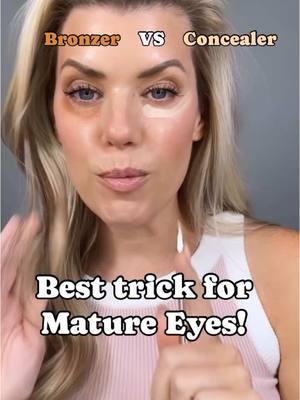 🥂My most viewed videos of 2024🥂 #3 out of 3! Here’s the science behind WHY this “HACK” is a much better option for mature eyes.  😬Unpopular opinion-“concealers” do not conceal. They only highlight your fine lines, settle in your wrinkles and look like makeup.  👏If you’re looking for a more natural approach try a BRONZER.  👉Because under eye darkness is typically the culprit of blues and purples. Bronzers are more warm and organs based and will often work as a perfect color corrector.  Using a  lighter shades will not work. It will only result in emphasize your fine lines and texture.  Using a cream based makeup will hydrate and give your mature skin a healthy radiant glow. Cream will not crease and cake. You’ll be left with hydrated natural looking under eyes. NEED MORE HELP?  Comment or text MATCH to 704-800-5691 and I can help you choose the correct shades for your skin tone and teach you how to apply makeup for your aging skin concerns. Currently shipping to 🇺🇸🇨🇦 January 6th we will be shipping to 🇬🇧!! England, Scotland, Wales, and Northern Ireland, we are coming for you!! 🇲🇽 AND 🇦🇺 YOURE NEXT!! Link to shirt can be found on my Amazon storefront!  Used: Tanlines bronzer White peach brightening highlight  Pink lemonade blush Linen highlight under concealer eye  #makeupover40 #makeupover50 #matureskinmakeup #beautyover40 #beautyuk #ukmakeupartist #australiamakeupartist #mexicanmakeup #bronzer #concealer #undereyebags #undereyecircles #filler #colorscience #seint #seintmakeup #nyx