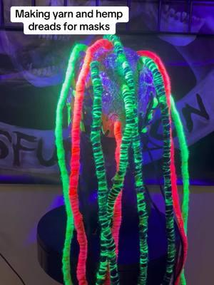 If anyone wanted to make their own dreads, here’s how I made a few. 💚🩷💛 I like using the yarn because it comes in different colors, textures and keeps them lightweight. Black light latex is added throughout each dread so it will not unravel.  #wardrobedysfunction #tutorial #tutorials #demonstration #dreadlocks #slipknot #blacklightart  #shareknowledge #inspirecreation 