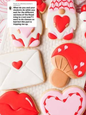 Replying to @cakesbycassidy the question is about needing to wait between steps at your cookie decorating classes; and that’s not really a problem I have because I plan out the designs to be decorated in a specific order so the icing can dry between steps. You can see here how I hop around between cookies at my Valentine’s Day class from last year. Plus because it’s a group setting with beginning decorators, we move at a slower pace than someone who is more experienced. And that allows for more drying time as well. #cookiedecoratingclass #cookieclass #cookiedecorating #royalicing #sugarcookies #valentinesdaycookies 