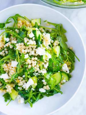 ✨seriously one of my favorite SALADS! My arugula salad with couscous, easy lemon vinaigrette, cucumbers, and feta cheese is one of my favorite arugula recipes. It’s unbelievably simple and tastes incredible. Once you try it, you’ll find yourself making it again and again! ✨ recipe is linked in our bio: @inspiredtaste  For the Salad: 1 ½ cups dried pearl couscous, about 3 cups cooked 3 ounces baby arugula or tender salad greens, about 4 cups Half of a hothouse (seedless) cucumber, chopped 2 ounces feta cheese, crumbled, about 1/2 cup For the Dressing: 2 tablespoons fresh lemon juice, about 1/2 large lemon 4 tablespoon extra virgin olive oil 1/2 teaspoon honey or maple syrup 1 tablespoon minced preserved lemon, optional 1 teaspoon dried basil or a handful chopped fresh basil leaves, optional Sea salt and fresh ground black pepper Recipe: https://www.inspiredtaste.net/36077/arugula-salad-with-couscous/  #inspiredtaste #EasyRecipes #simplerecipes #foodblogeats #salad #saladsofinstagram #arugula