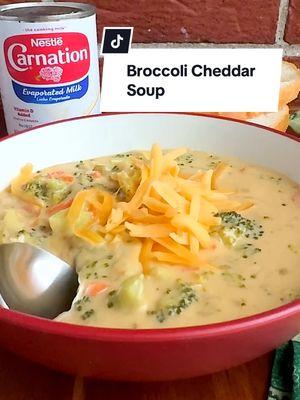 This creamy, cheesy, broccoli cheddar soup is the perfect way to warm up this winter! 🥰 #broccolicheddarsoup #broccoli #cheddar #soup #Recipe #soupseason #winterrecipes #carnationmilk #carnationnation  Broccoli Cheddar Soup Ingredients 6Tbsp butter, divided 1 small yellow onion, minced 4 cloves of garlic, minced ¼ c flour 2 1/2c chicken broth 2c Carnation Evaporated Milk 2c broccoli florets diced into bite-sized pieces 1c broccoli stems diced into bite-sized pieces 2 large carrots, sliced into thin half-moon shapes 1 tsp salt ¼ tsp white pepper or black pepper ½ tsp smoked paprika ½ tsp dry mustard powder ⅛ tsp cayenne pepper 8oz sharp cheddar cheese, shredded How to make broccoli cheddar soup 1. In a large stockpot over medium heat melt 2 Tbsp butter. Add diced onion and cook until soft. About 4-5 minutes. Add garlic, salt, pepper, smoked paprika, mustard powder, and cayenne and cook until fragrant. About 30 seconds. Spoon into a bowl and set aside.  2. Return the pan to the heat and melt the remaining butter. Sprinkle flour over the top and stir constantly for about 3-4 minutes to cook out the flour.  3. Slowly whisk in the chicken broth into the roux, followed by the Carnation Evaporated Milk. Turn the heat down to low and cook for about 15 minutes, stirring occasionally, until slightly thickened. Add the onion mixture back into the pot, broccoli, and carrots. Cover and allow the soup to simmer for 20 minutes on low while opening the lid and stirring occasionally.  4. Stir in most of the cheddar cheese reserving some for serving. Ladle the soup into bowls. Top with the reserved cheese and serve with crust bread for the perfect comfort meal! 